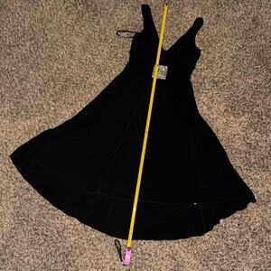 Black v neck mini dress with white beaded design